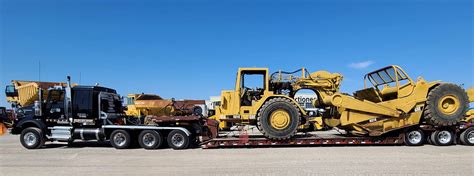 trucks hauling mini excavators|heavy equipment hauler near me.